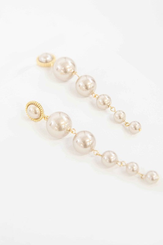 Sun Pearl Dangle Earrings