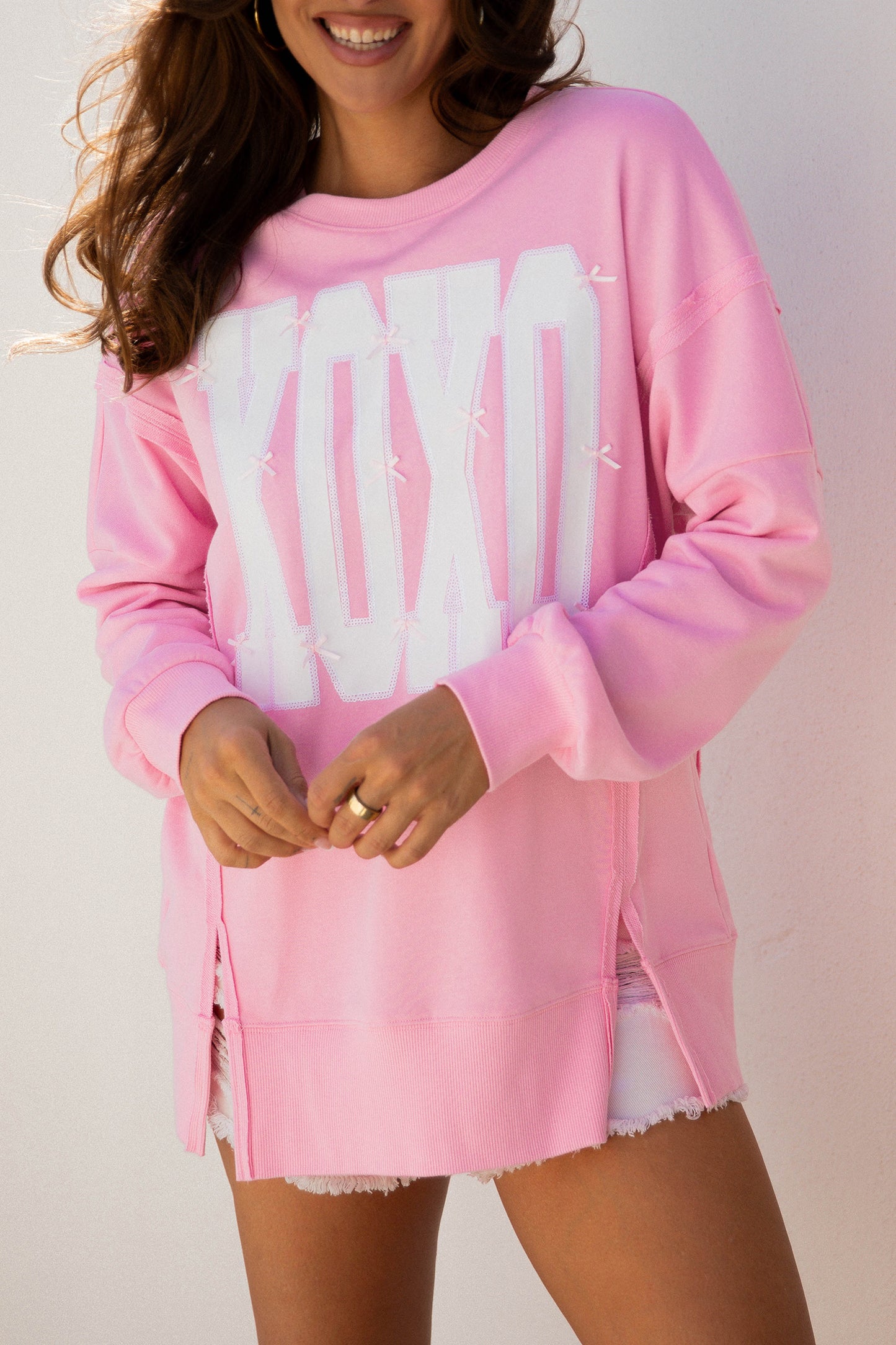 Black Bow Sequin XOXO Letter Graphic Exposed Seam Baggy Sweatshirt